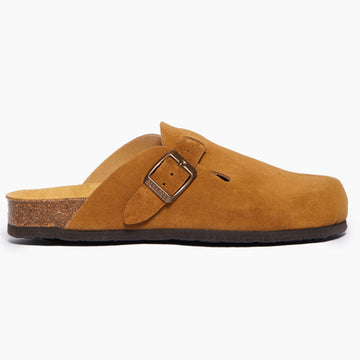 A Dark Tan suede clog shoe with a buckle-up closure, adjustable strap a flat cork insole and EVA outsole.